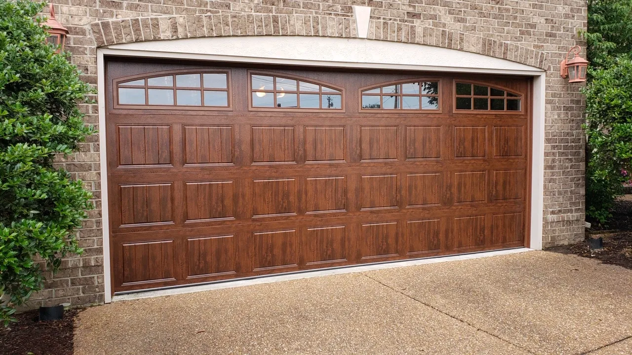 Dad & Daughter garage door project, brentwood tn 16x7 woodgrain custom arch glass custom walnut new