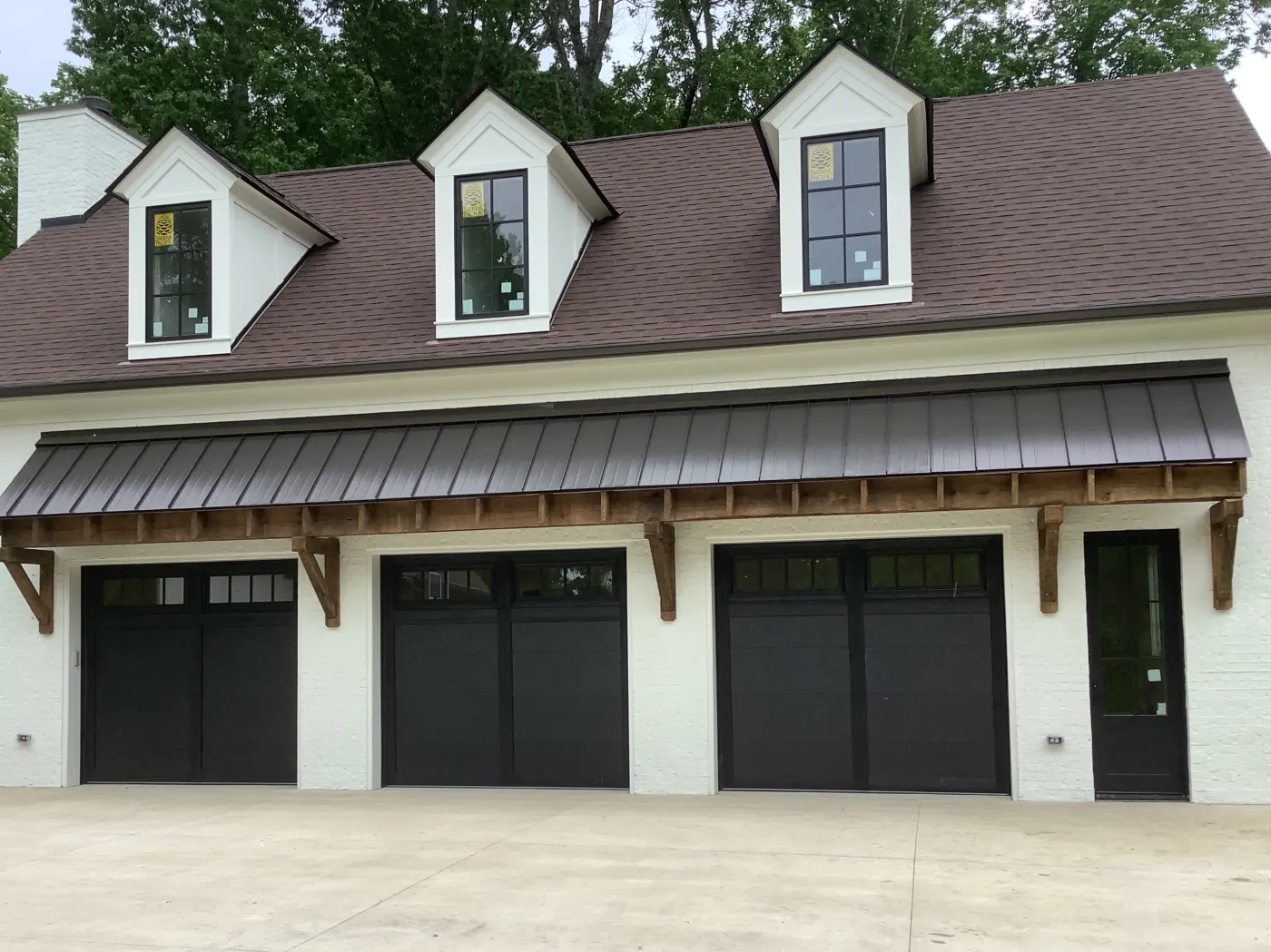 Dad & Daughter garage door project, brentwood tn three overlay black 9x8 glass new construction
