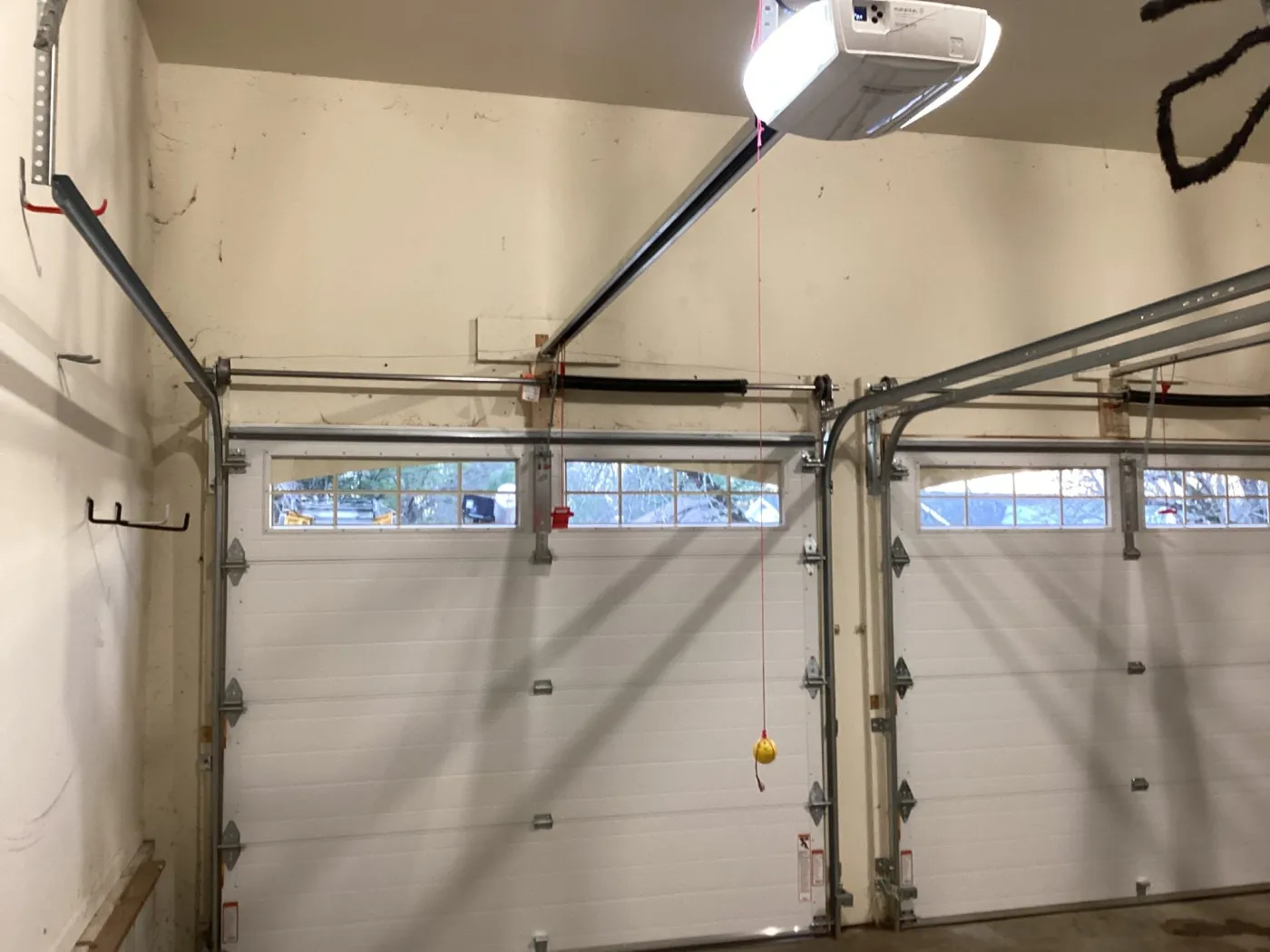 Dad & Daughter garage door project, interior 9x7 steel back insulated garage door with torsion spring and marantec motor