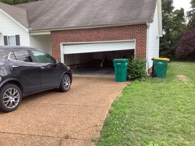 Dad & Daughter garage door project, brentwood tn stuck open damage off track 16x7