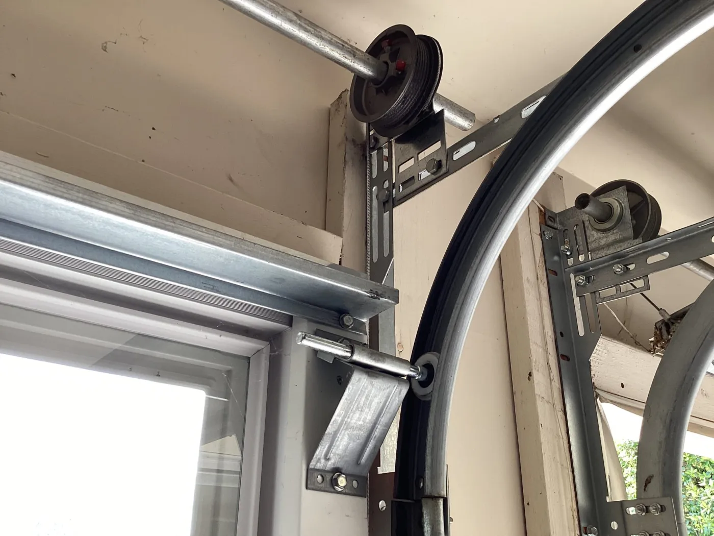 Dad & Daughter garage door project, drum cable roller hinge brentwood tn