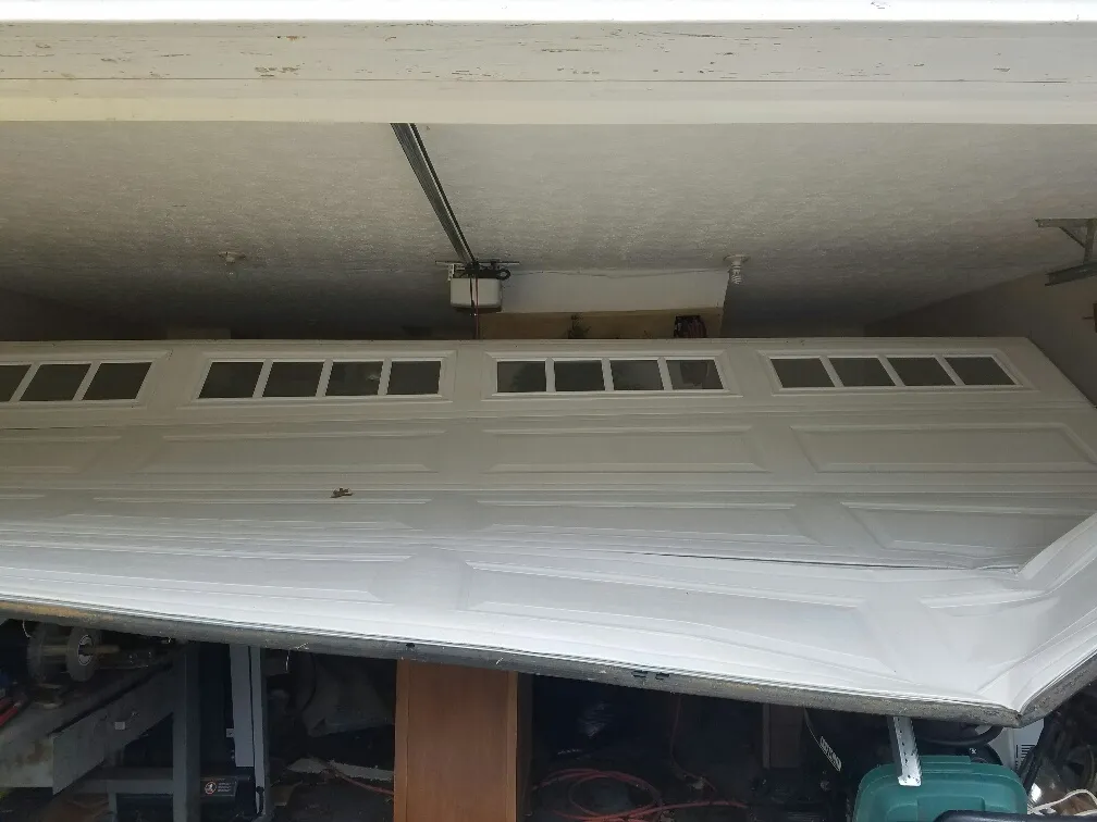 Dad & Daughter garage door project, white broken off track repair glass white 16x7