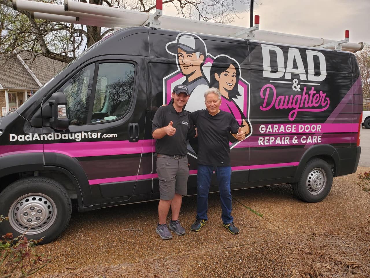 Dad & Daughter technician servicing a garage door