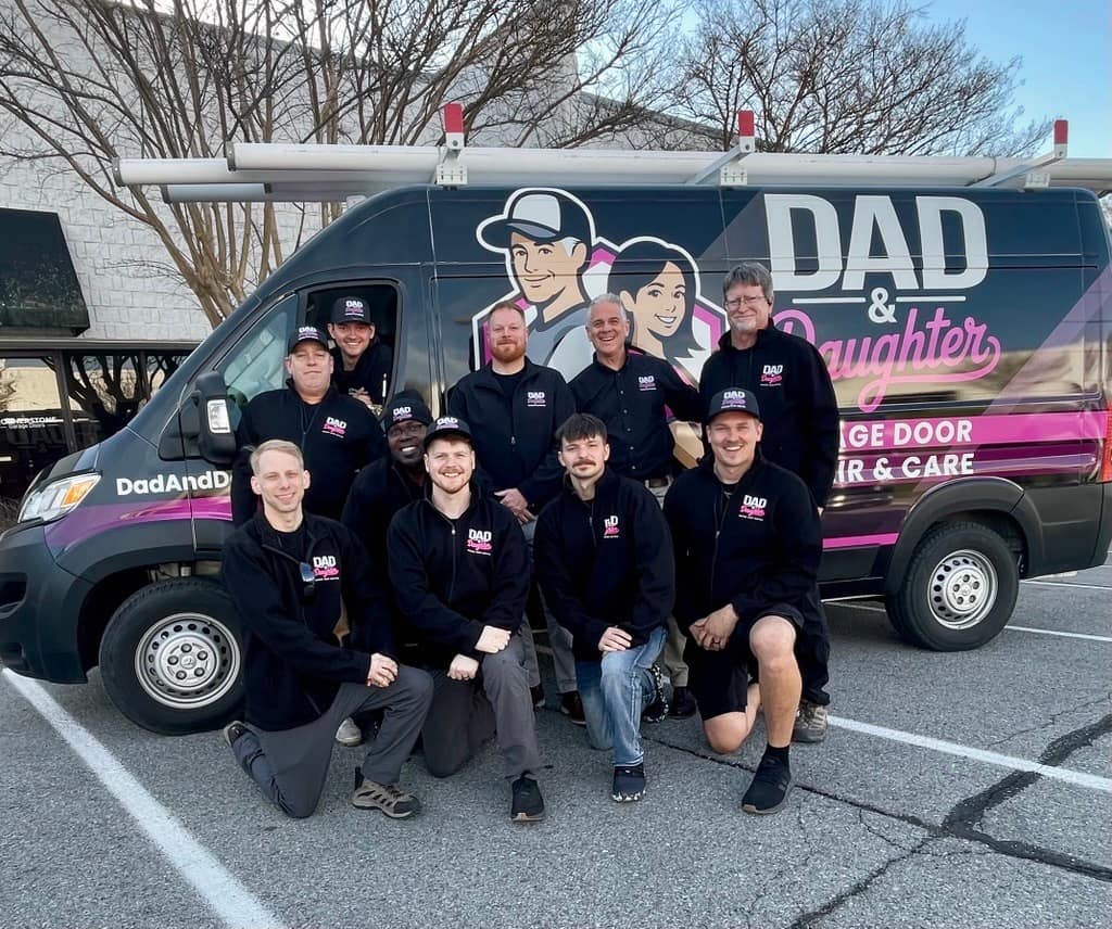 Dad & Daughter team in front of branded service van